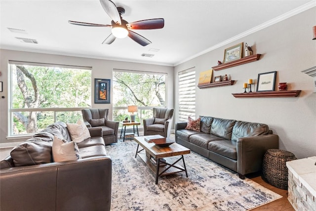 102 Cheerful Ct, Lakeway, TX 78734 - living room featuring a ceiling fan, wood finished floors, and crown molding