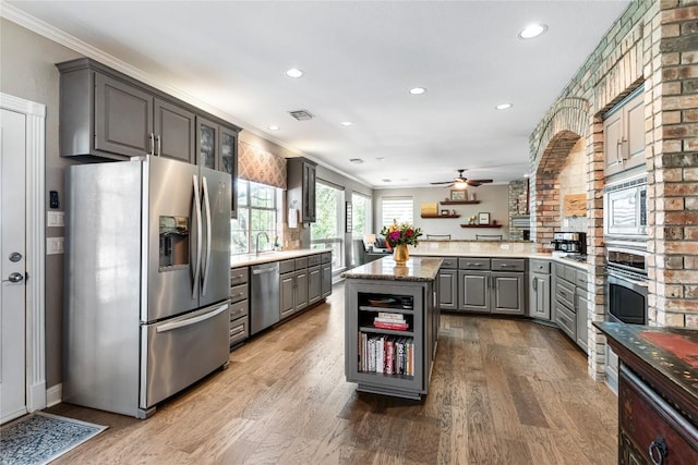 102 Cheerful Ct, Lakeway, TX 78734 - kitchen with stainless steel appliances, gray cabinetry, recessed lighting, a ceiling fan, and wine cooler