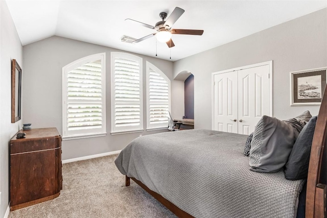 102 Cheerful Ct, Lakeway, TX 78734 - bedroom with a closet, carpet floors, ceiling fan, arched walkways, and baseboards