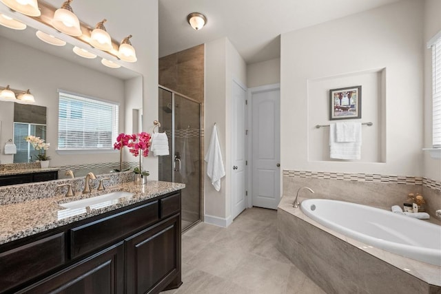 143 Pink Granite Blvd, Dripping Springs, TX 78620 - full bath featuring a stall shower, vanity, and a bath