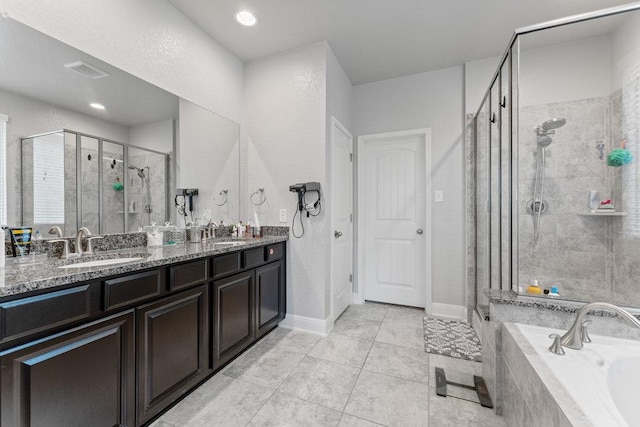 13911 Tribeca, San Antonio, TX 78245 - full bath featuring a stall shower, a garden tub, double vanity, and tile patterned floors