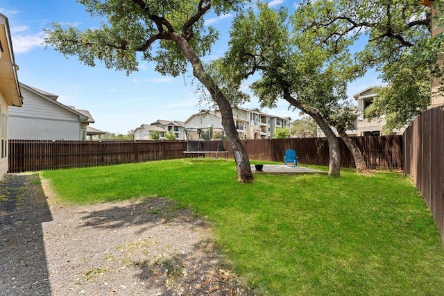 13911 Tribeca, San Antonio, TX 78245 - view of yard with a trampoline and a residential view