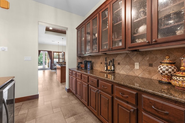 2904 Kodiak Cv, Cedar Park, TX 78613 - indoor dry bar featuring decorative backsplash and wine cooler