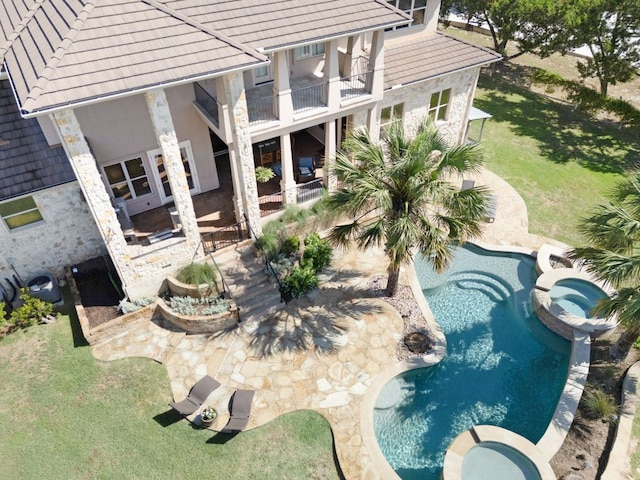 2904 Kodiak Cv, Cedar Park, TX 78613 - view of pool featuring a pool with connected hot tub, a yard, and a patio