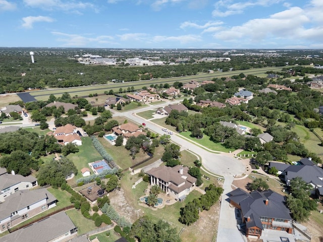 2904 Kodiak Cv, Cedar Park, TX 78613 - aerial view of property's location with nearby suburban area and a tree filled landscape