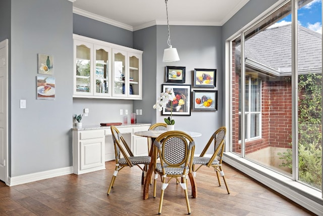 10003 Baxter Ln, Austin, TX 78736 - dining room with healthy amount of natural light, dark wood-style flooring, and ornamental molding