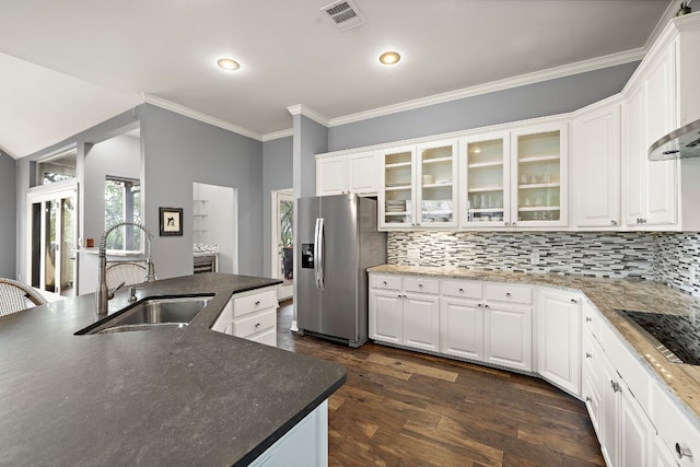 10003 Baxter Ln, Austin, TX 78736 - kitchen featuring stainless steel fridge, ornamental molding, backsplash, dark wood-type flooring, and white cabinetry