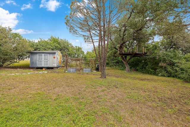10003 Baxter Ln, Austin, TX 78736 - view of green lawn with a storage unit