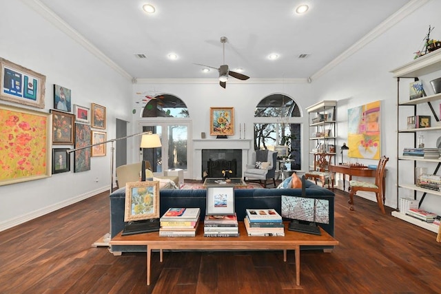 10003 Baxter Ln, Austin, TX 78736 - living area with ornamental molding, ceiling fan, wood finished floors, recessed lighting, and a tiled fireplace