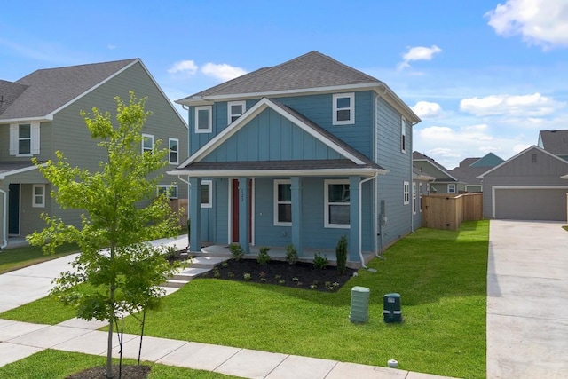 122 Elm Branch Trl, Taylor, TX 76574 - view of front of property featuring board and batten siding, a porch, concrete driveway, a shingled roof, and a garage