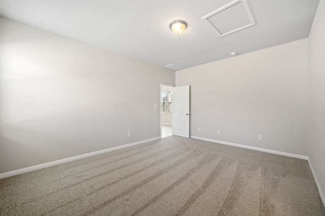 122 Elm Branch Trl, Taylor, TX 76574 - carpeted empty room with attic access and baseboards