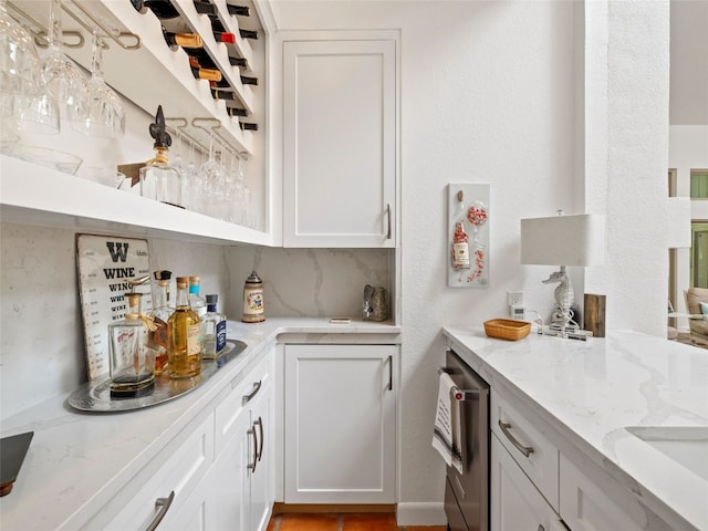 106 Southern Spur, Horseshoe Bay, TX 78657 - kitchen with white cabinets and light stone countertops
