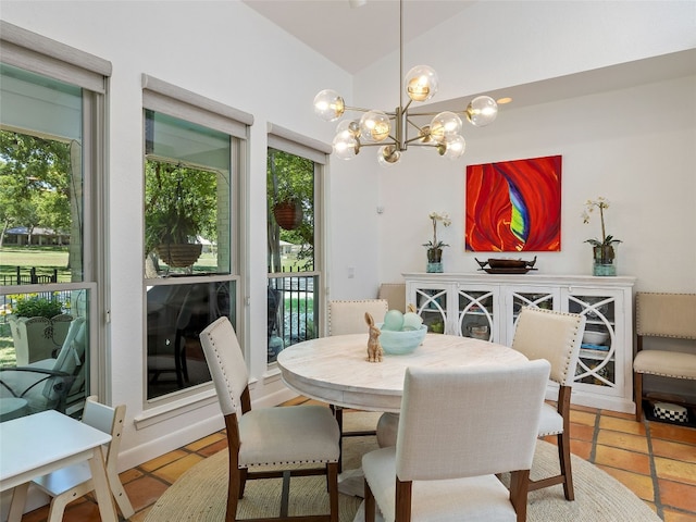 106 Southern Spur, Horseshoe Bay, TX 78657 - dining space featuring healthy amount of natural light, a chandelier, vaulted ceiling, and tile patterned floors