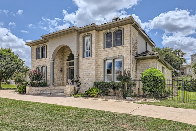 29 Tiburon Dr, The Hills, TX 78738 - mediterranean / spanish-style home featuring stone siding