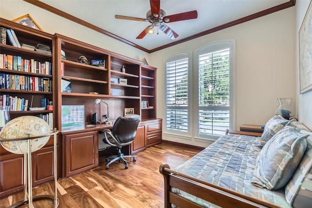 29 Tiburon Dr, The Hills, TX 78738 - office with ceiling fan, built in desk, light wood-style flooring, and ornamental molding
