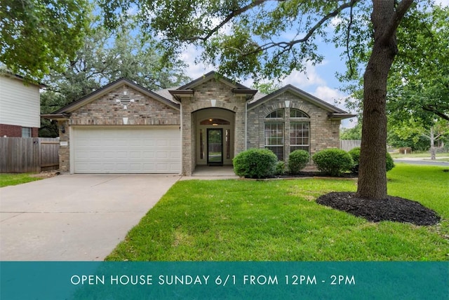 10500 Hendon St, Austin, TX 78748 - view of front facade featuring a garage, driveway, and brick siding