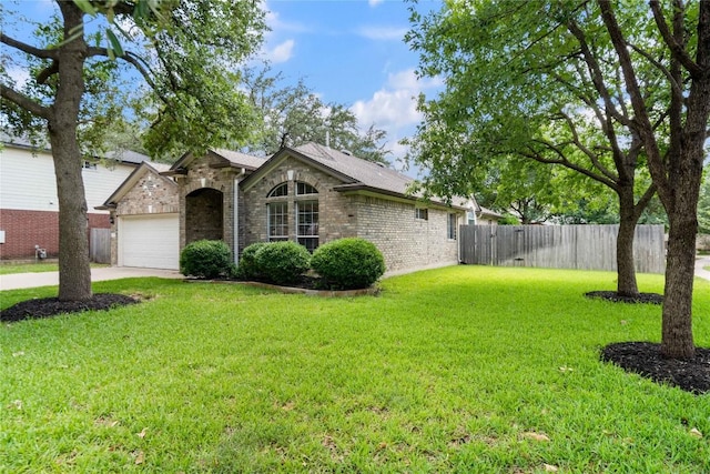 10500 Hendon St, Austin, TX 78748 - view of front of home with brick siding, concrete driveway, and a garage