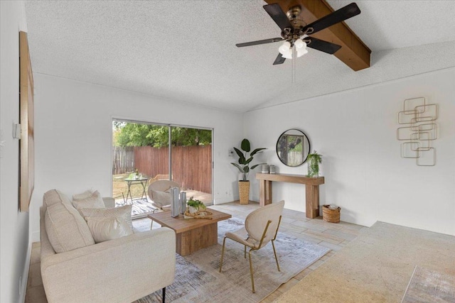 8900 Tina Ct, Austin, TX 78758 - living area with a ceiling fan, a textured ceiling, and stone finish floors