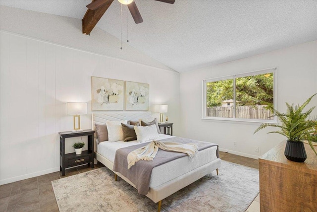 8900 Tina Ct, Austin, TX 78758 - bedroom featuring a textured ceiling, ceiling fan, and baseboards