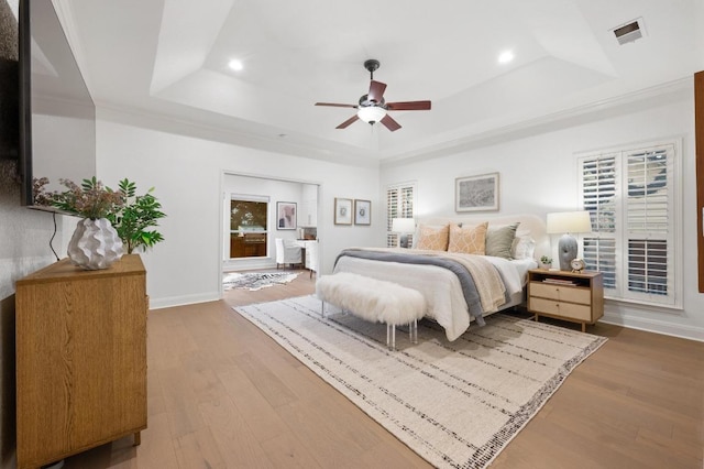 3404 Riva Ridge Rd, Austin, TX 78746 - bedroom featuring a tray ceiling, wood finished floors, recessed lighting, baseboards, and ceiling fan