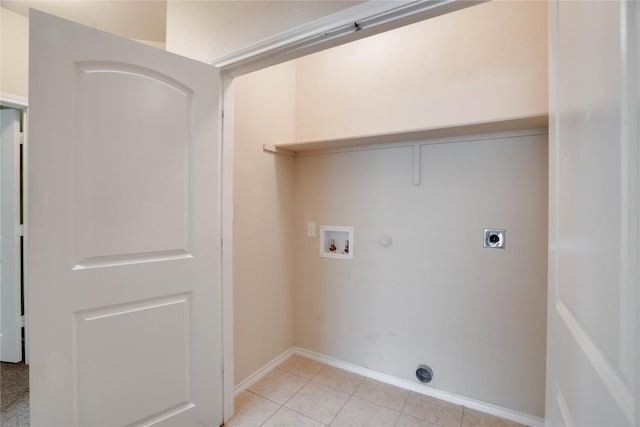 113-119 Creekside Villa Dr, Kyle, TX 78640 - laundry room with gas dryer hookup, washer hookup, hookup for an electric dryer, light tile patterned floors, and baseboards