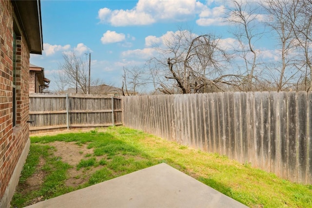 113-119 Creekside Villa Dr, Kyle, TX 78640 - fenced backyard featuring a patio area