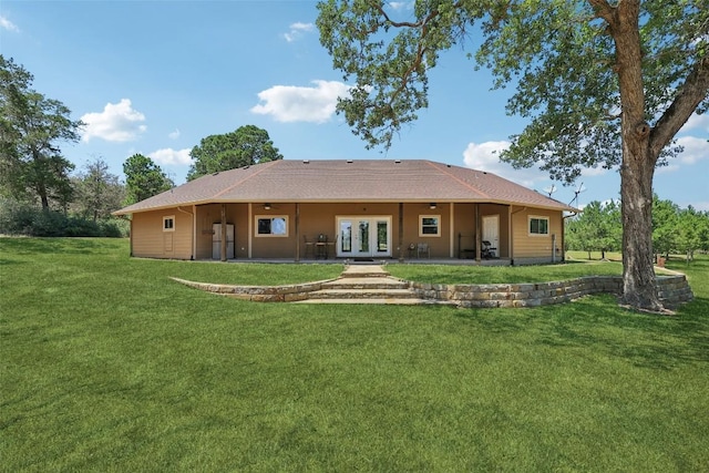 129 Country Air Dr, Bastrop, TX 78602 - rear view of property featuring french doors, a patio, a lawn, and a ceiling fan