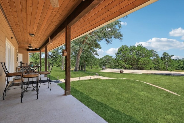 129 Country Air Dr, Bastrop, TX 78602 - view of patio featuring ceiling fan and outdoor dining area