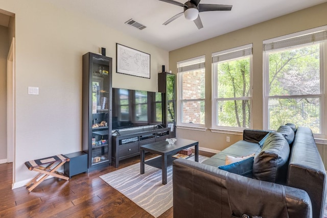 8132 Amelia Cv, Austin, TX 78750 - living area with ceiling fan and dark wood-type flooring
