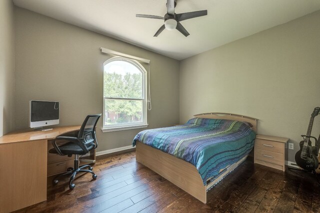 8132 Amelia Cv, Austin, TX 78750 - bedroom featuring dark wood-type flooring, an office area, and ceiling fan