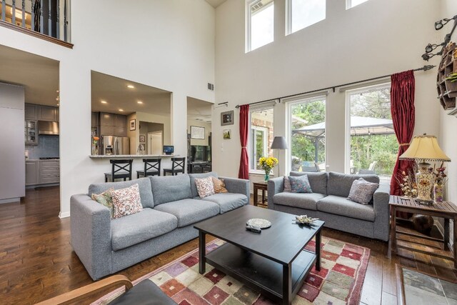 8132 Amelia Cv, Austin, TX 78750 - living room with wood-type flooring and a high ceiling