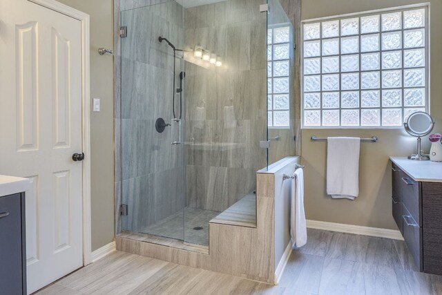 8132 Amelia Cv, Austin, TX 78750 - bathroom featuring vanity and a stall shower