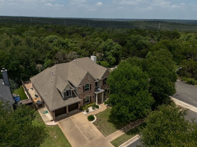 8132 Amelia Cv, Austin, TX 78750 - view of subject property with a heavily wooded area