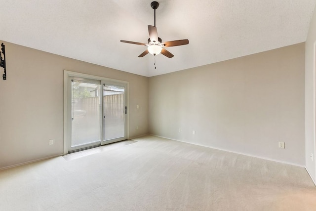 707 Clearwater Trl, Round Rock, TX 78664 - unfurnished room with ceiling fan, light carpet, and baseboards