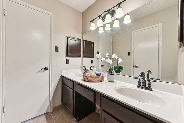 707 Clearwater Trl, Round Rock, TX 78664 - full bathroom featuring double vanity and tile patterned flooring