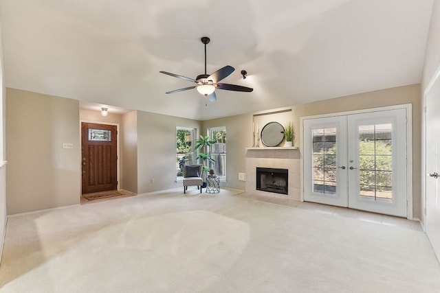 707 Clearwater Trl, Round Rock, TX 78664 - unfurnished living room featuring baseboards, a ceiling fan, carpet, french doors, and vaulted ceiling