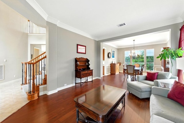 10220 N Chestnut Ridge Rd, Austin, TX 78726 - living area featuring a chandelier, crown molding, stairway, wood finished floors, and baseboards