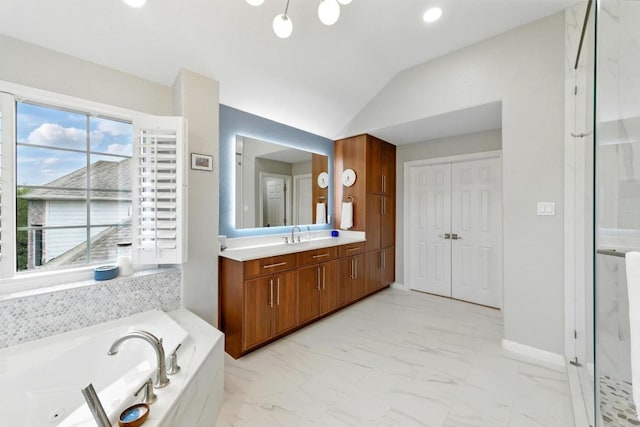 10220 N Chestnut Ridge Rd, Austin, TX 78726 - full bathroom with marble finish floors, a jetted tub, a stall shower, vanity, and vaulted ceiling