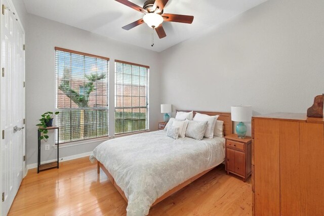 10220 N Chestnut Ridge Rd, Austin, TX 78726 - bedroom featuring light wood-type flooring, baseboards, and ceiling fan