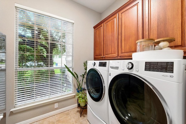 10220 N Chestnut Ridge Rd, Austin, TX 78726 - laundry room with independent washer and dryer, cabinet space, light tile patterned floors, and baseboards