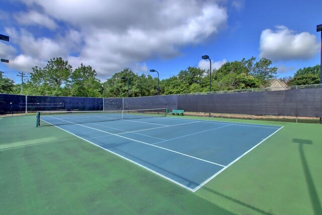 10220 N Chestnut Ridge Rd, Austin, TX 78726 - view of tennis court with community basketball court