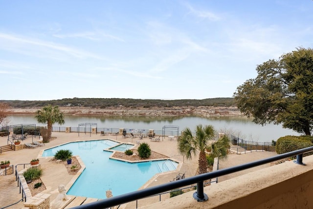 3404 American Dr Unit 1201, Lago Vista, TX 78645 - community pool featuring a water view and a patio