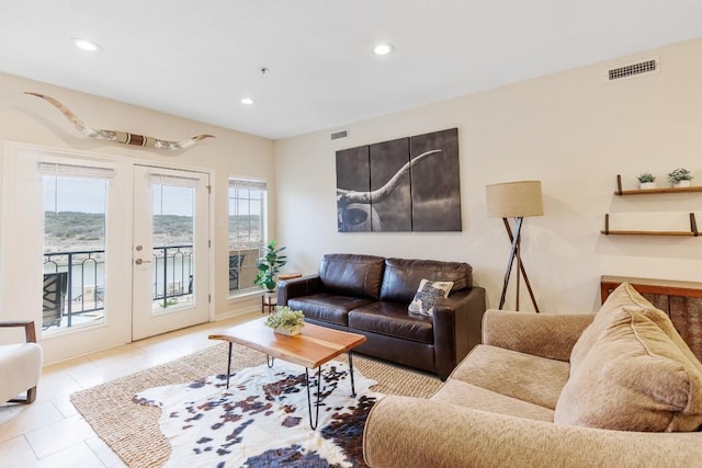 3404 American Dr Unit 1201, Lago Vista, TX 78645 - living room with recessed lighting, french doors, and tile patterned flooring