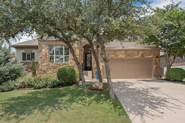 8316 Evelina Trl, Austin, TX 78737 - view of front facade with stone siding, driveway, and a front lawn