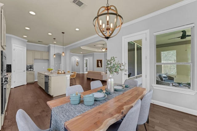 8316 Evelina Trl, Austin, TX 78737 - dining space featuring crown molding, a chandelier, dark wood-style floors, recessed lighting, and baseboards