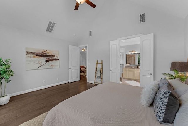 8316 Evelina Trl, Austin, TX 78737 - bedroom featuring high vaulted ceiling, wood finished floors, ensuite bathroom, baseboards, and a ceiling fan