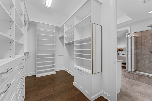 8316 Evelina Trl, Austin, TX 78737 - walk in closet featuring dark wood-style flooring
