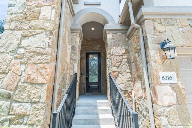 8316 Evelina Trl, Austin, TX 78737 - doorway to property featuring stone siding