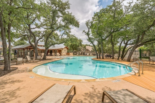 8316 Evelina Trl, Austin, TX 78737 - community pool featuring a patio