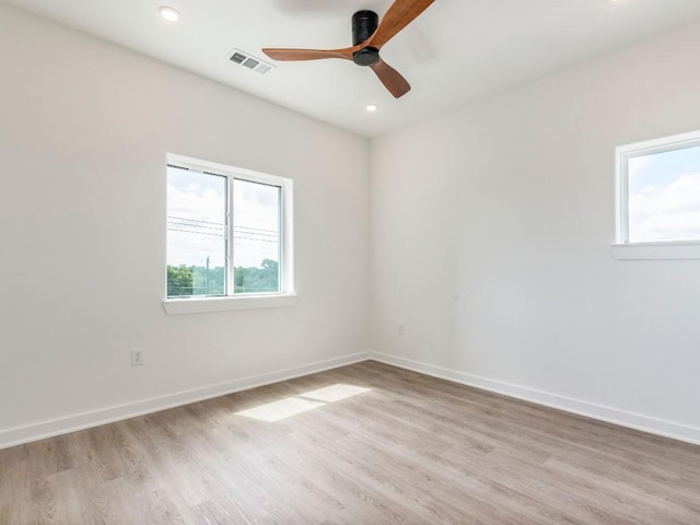 4802 S Congress Ave Unit 310, Austin, TX 78745 - spare room with light wood-style floors, ceiling fan, and recessed lighting
